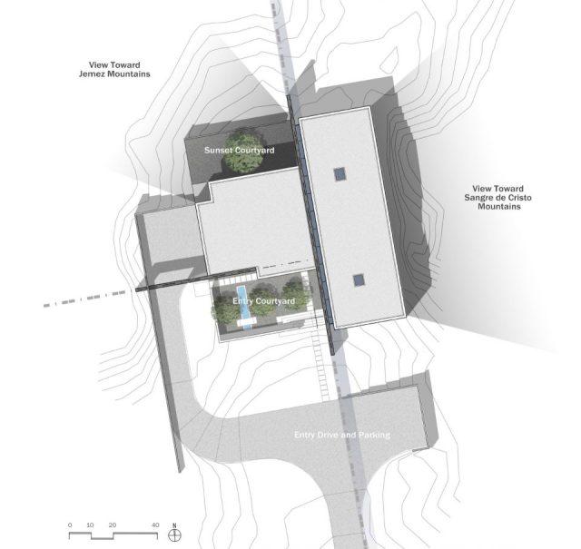 一層現代風格山間別墅，兩面混凝土墻壁打開整個建筑空間