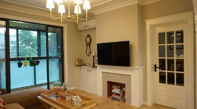 98平新房簡美風格裝修完成，尤其是電視墻造型，做成了一個假壁爐，超美！